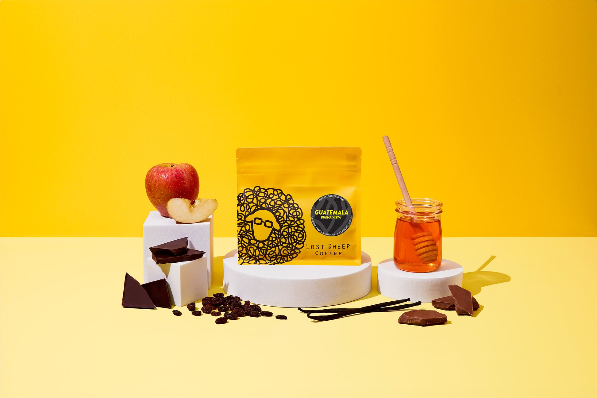 The Guatemala Buena Vista Lost Sheep coffee packaging against a yellow background.