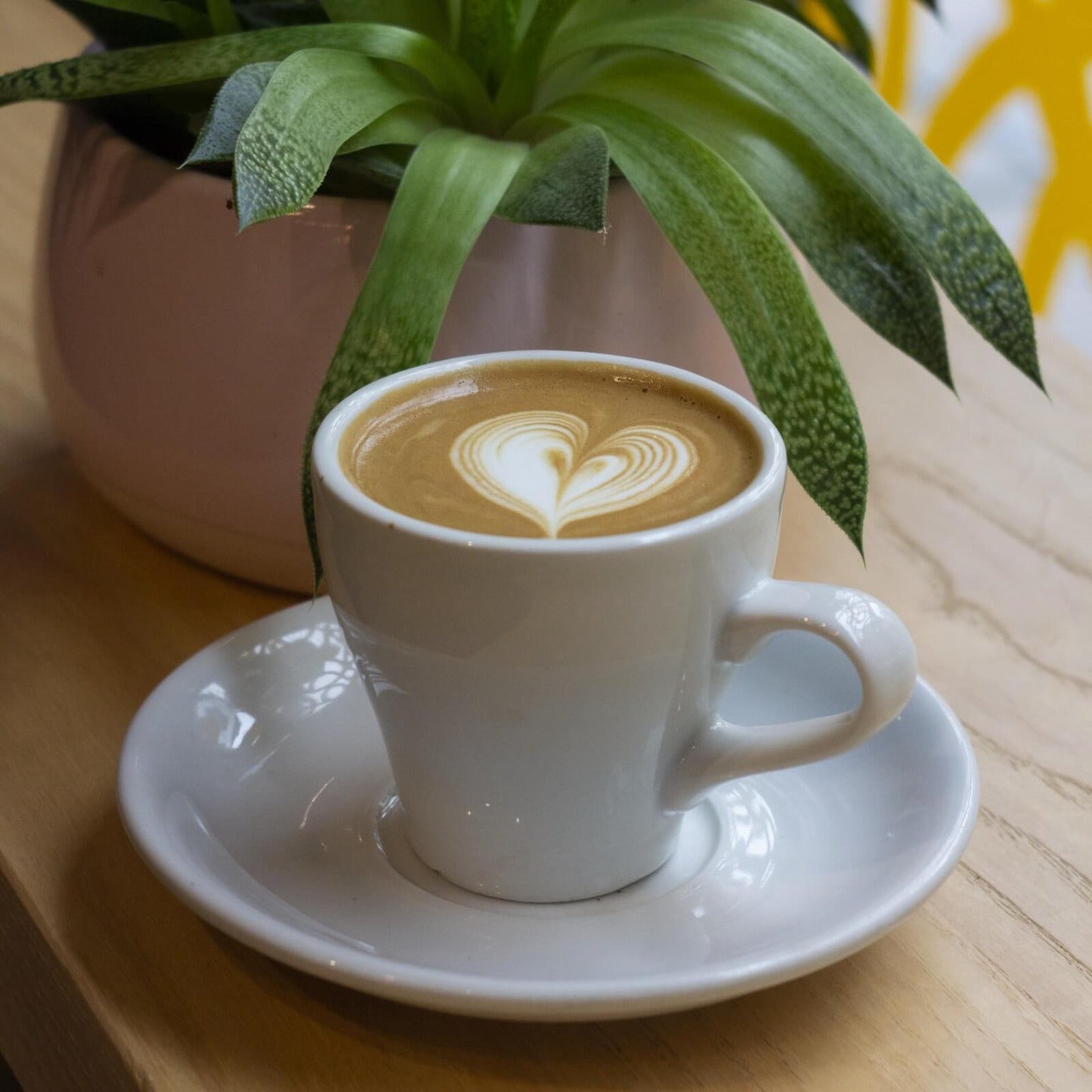 A flat white coffee at Lost Sheep Coffee