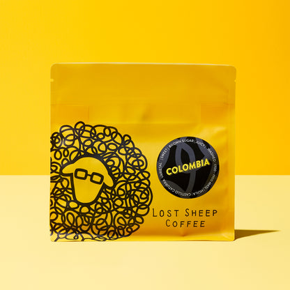 Colombia Huila coffee beans in yellow Lost Sheep Coffee packaging