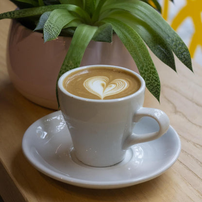 A flat white coffee at Lost Sheep Coffee